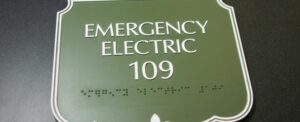 Signs constructed of photopolymer provide a very durable form of tactile signage with raised text and braille, which is integral to the sign face, and offers added resistance in areas where vandalism could be an issue and utilizes many finish options to supply unique, long lasting products. Read more in an article where Bill Baker, President of Park Place Sign Systems, recently discussed photopolymer signage.