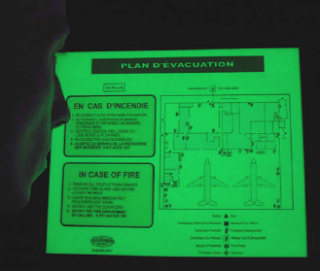 Many new building codes require the use of photo-luminescent materials for interior stairwells and emergency exits along with identifying fire extinguishers and other emergency aids. Contact us today with any questions regarding the use of photo-luminescent materials in your next project.