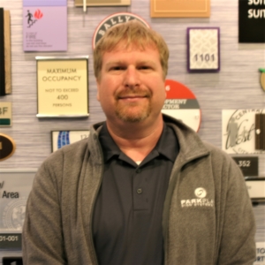 Staff—Justin Dugger, Artwork & Sign Layout Specialist